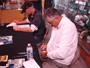 Rollie signing at the store